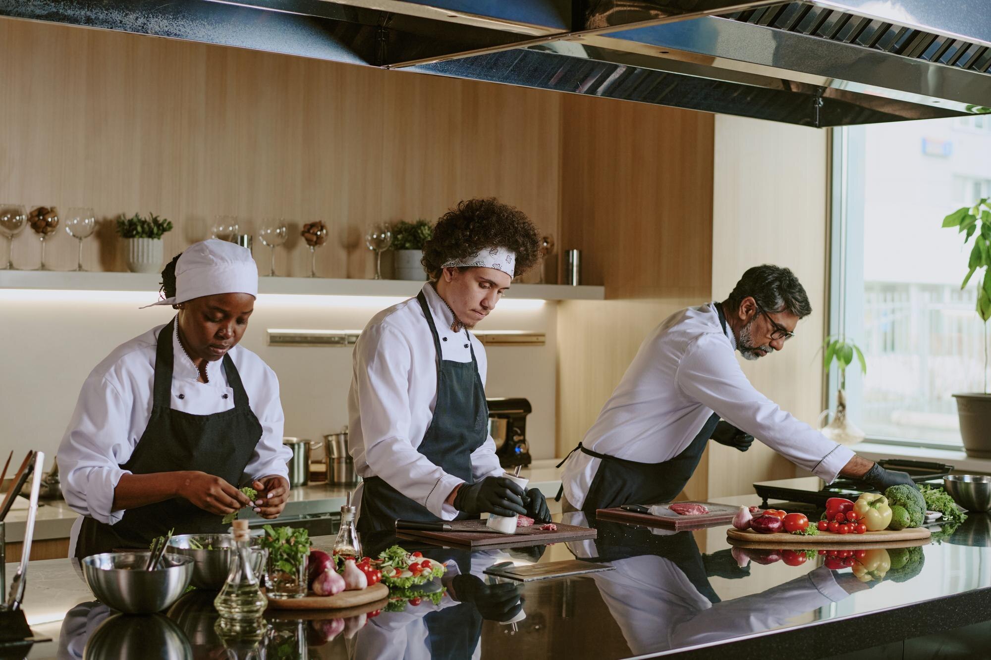 Restaurant owner onboarding kitchen staff quickly during a busy shift